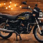 Hero Splendor Plus 2026 bike wooden background mileage 75 kmpl